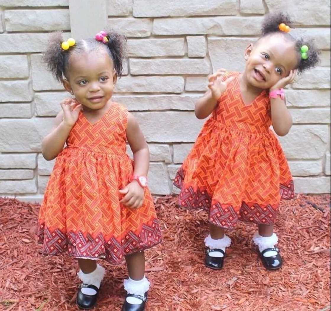 Ankara coral dress with a pattern for baby girl