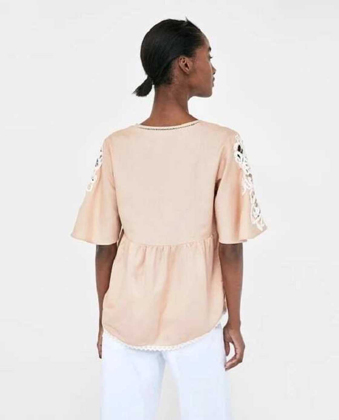 Blouse with lace decor Blouse with lace decor