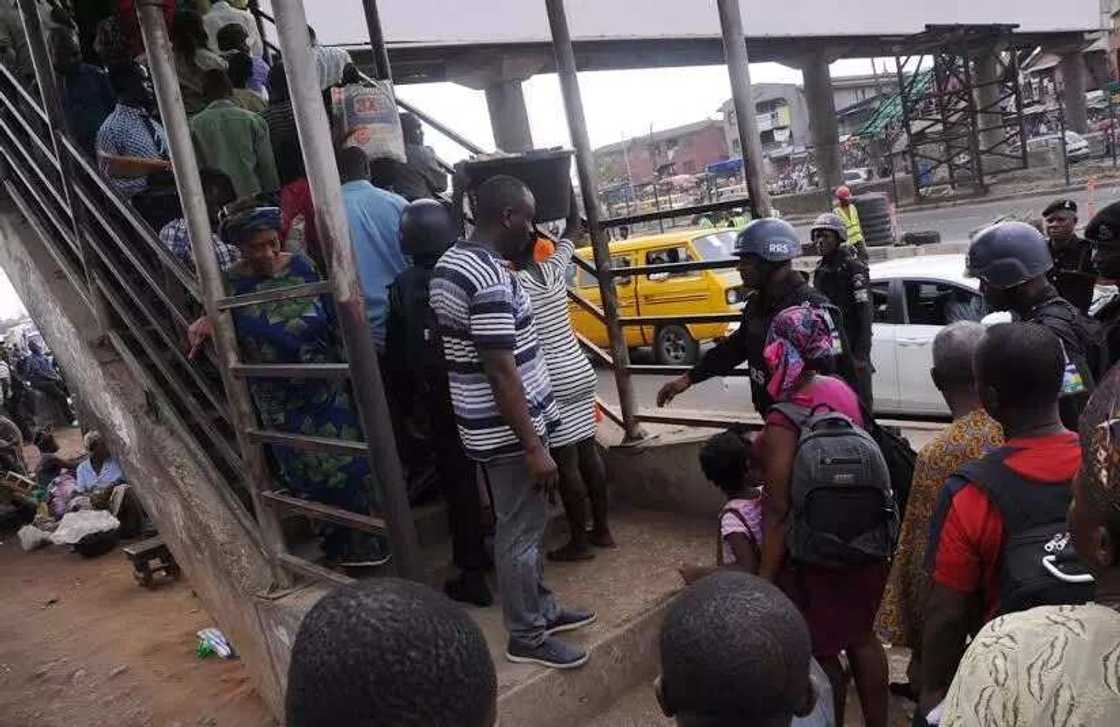 Police maintains law and order at Ojota pedestrian bridge