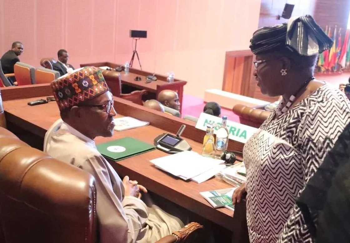 Ex-minister Okonjo-Iweala meets President Buhari at AU summit