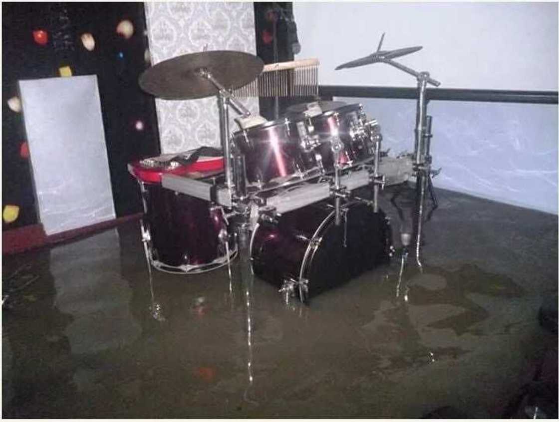 Members of a church worship inside a flooded arena in Port Harcourt