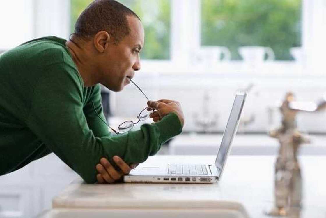 Man using laptop Man using laptop