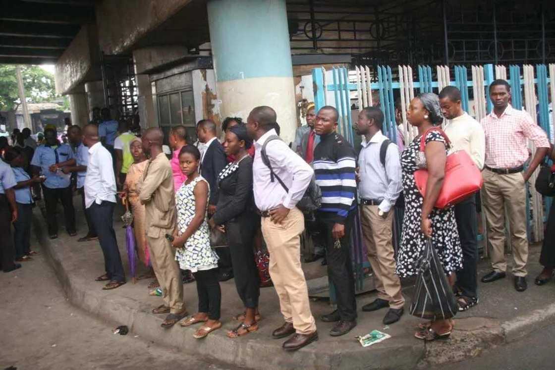 (Photos) Lagosians Wait Long Hours For BRT Bus