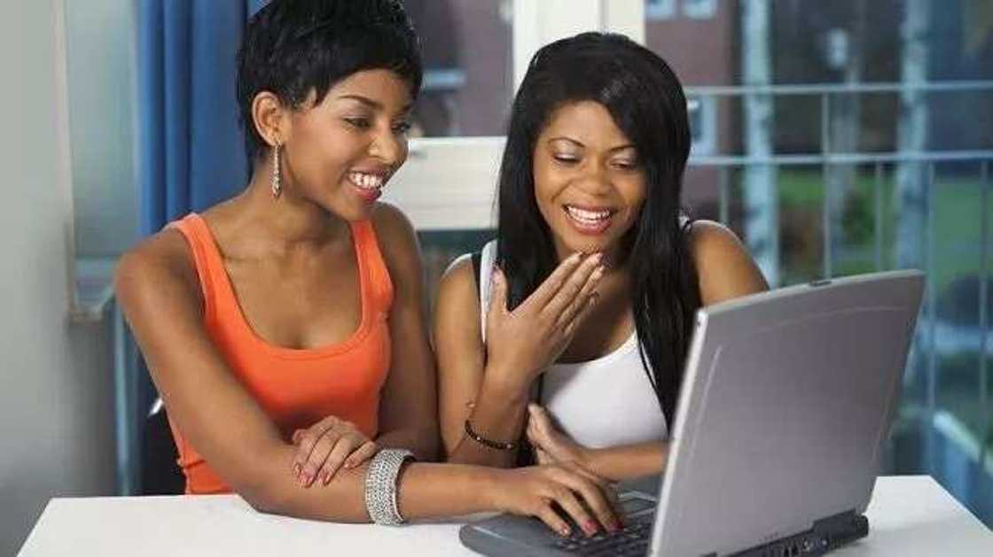 Two women on the laptop Two women on the laptop