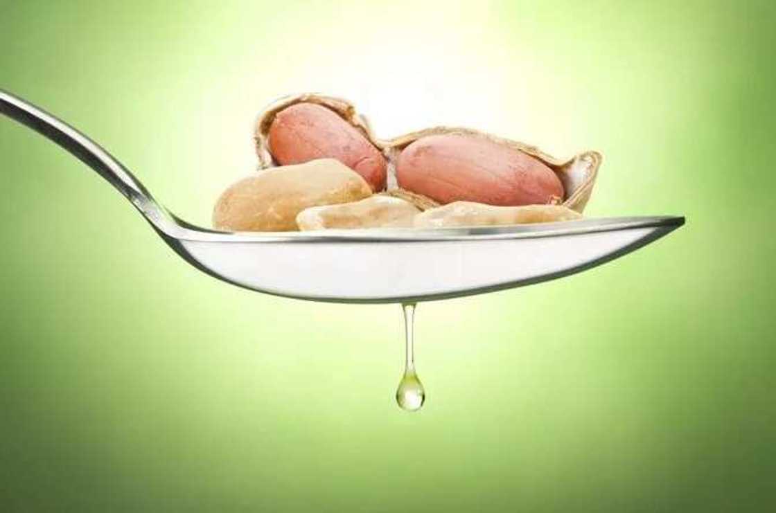 Spoon with groundnut oil Spoon with groundnut oil