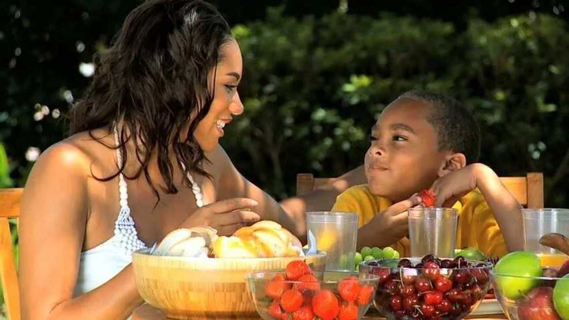 Nigerian family eating food