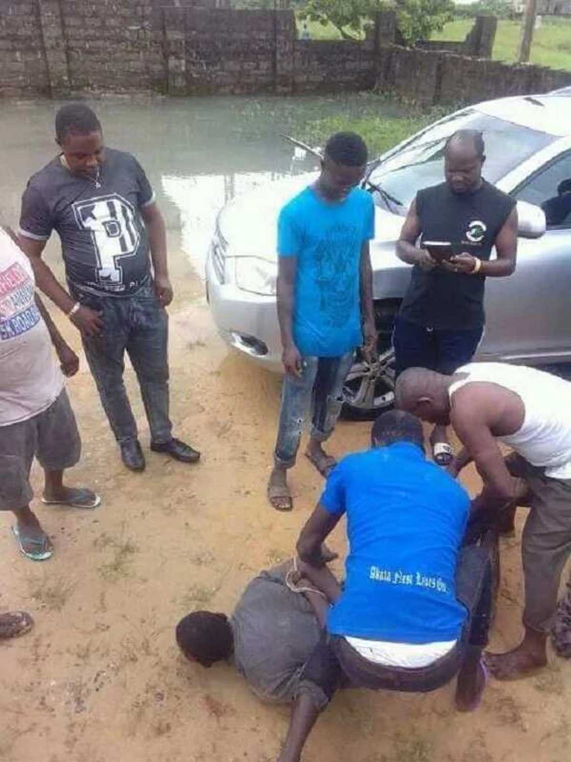 Man caught stealing at church in Warri, Delta state, receives prayers from members (Photos) Man caught stealing at church in Warri, Delta state, receives prayers from members (Photos)