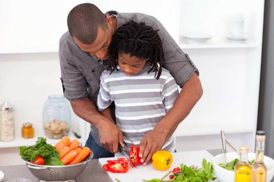 Father and son cooking