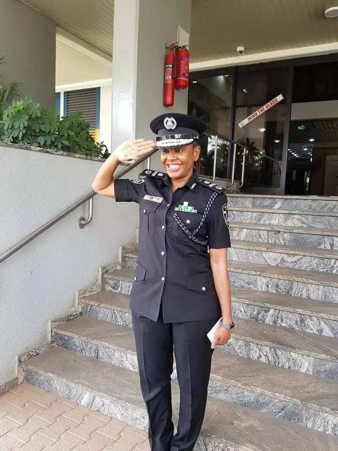 Smiling police woman gets promotion as assistant inspector general of police (photos)