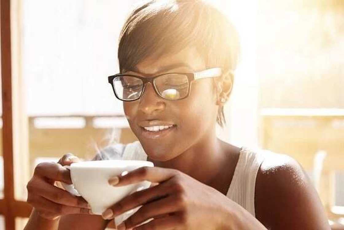 woman with soursop leaves tea woman with soursop leaves tea