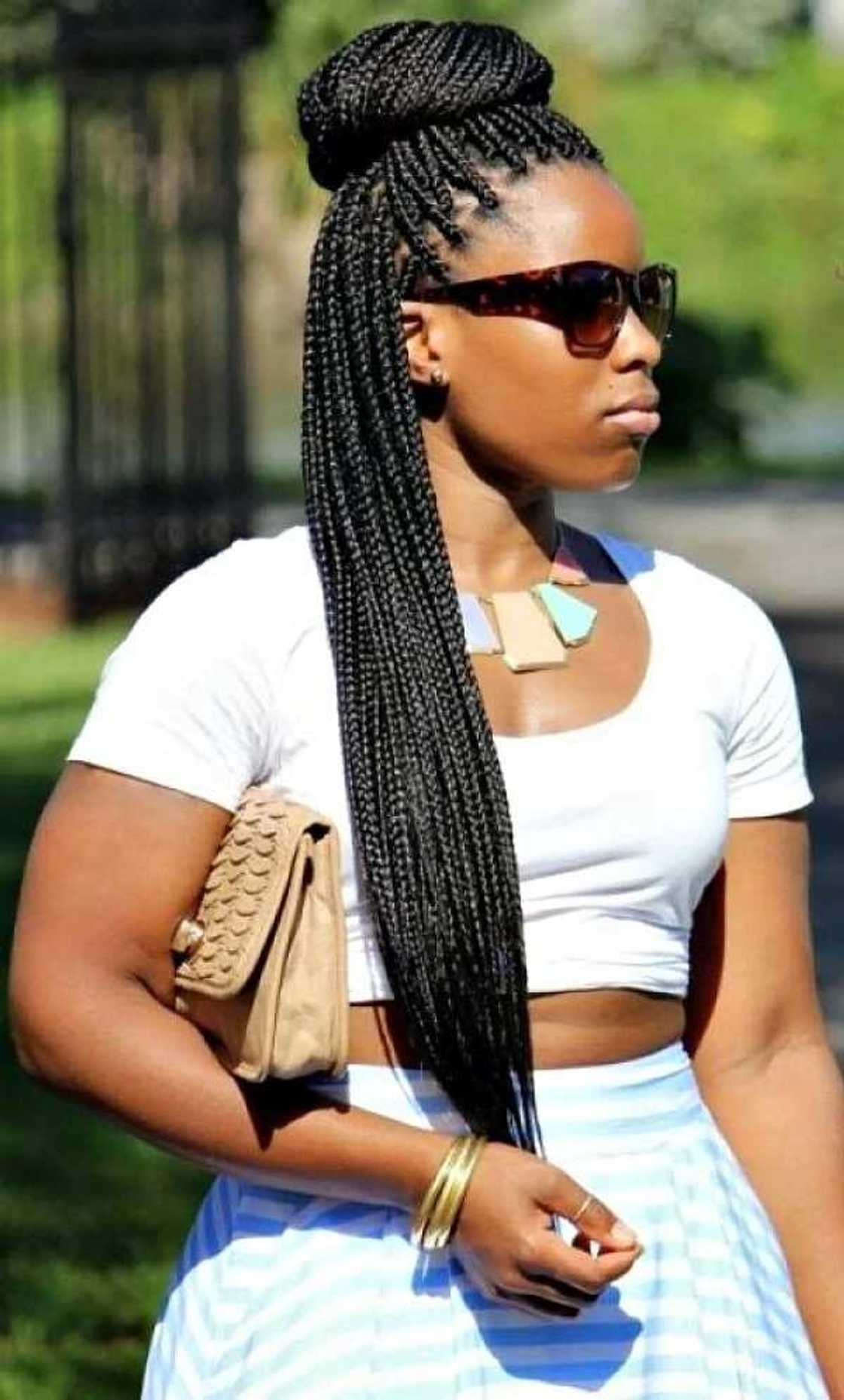 Nigerian braids for round face with small updo Nigerian braids for round face with small updo