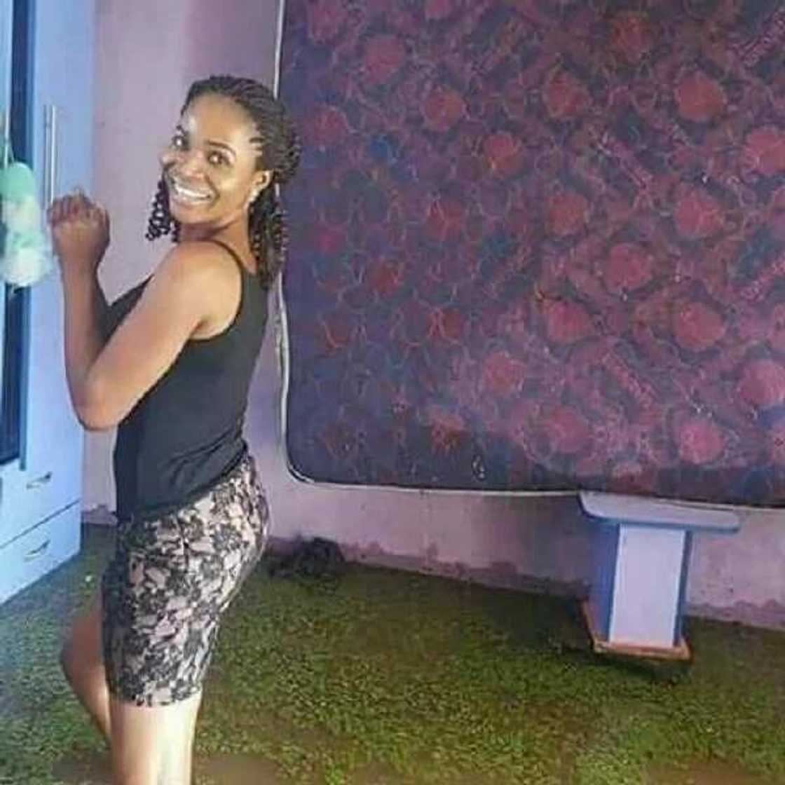 Young lady strikes a pose in front of her house as flood overtakes it in Benue state (photos) Young lady strikes a pose in front of her house as flood overtakes it in Benue state (photos)