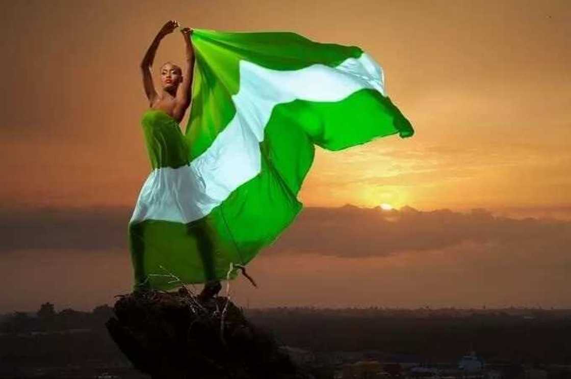 woman n nigerian flag woman n nigerian flag