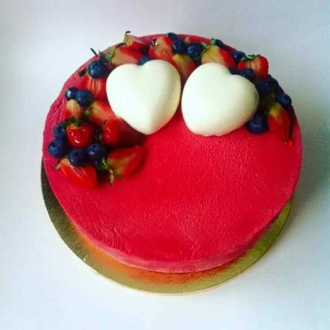 Wedding anniversary cake decorated with fruit Wedding anniversary cake decorated with fruit