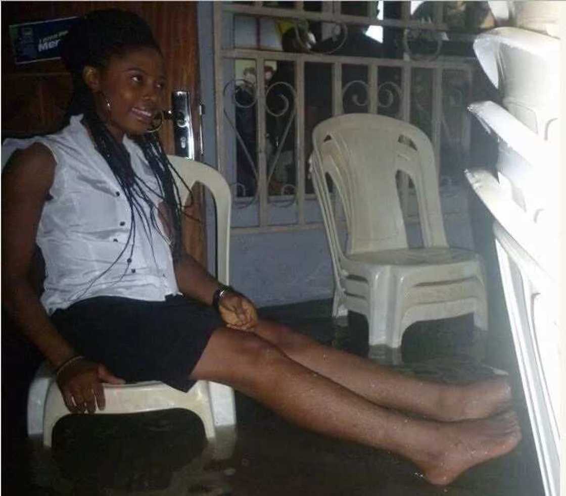 Members of a church worship inside a flooded arena in Port Harcourt