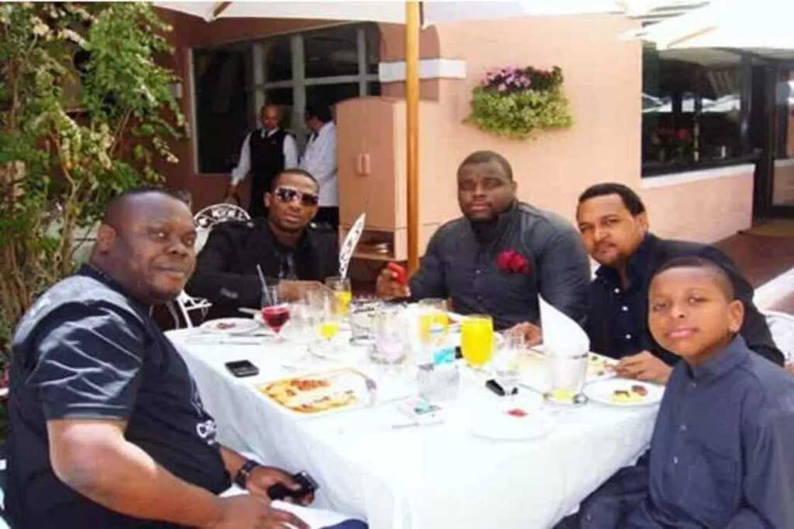 The Madueke children dining with DBanj