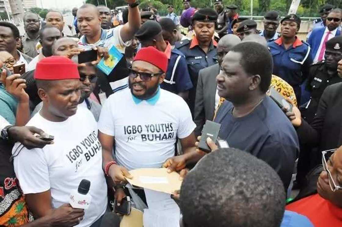 Special Adviser to the President on Media, Femi Adesina (r) receiving a letter from the Coordinators of Coalition of Ibo Groups for Buhari, Hon. Demian Igbokwe (l) and Hon. Nkem . Photo credit: NAN