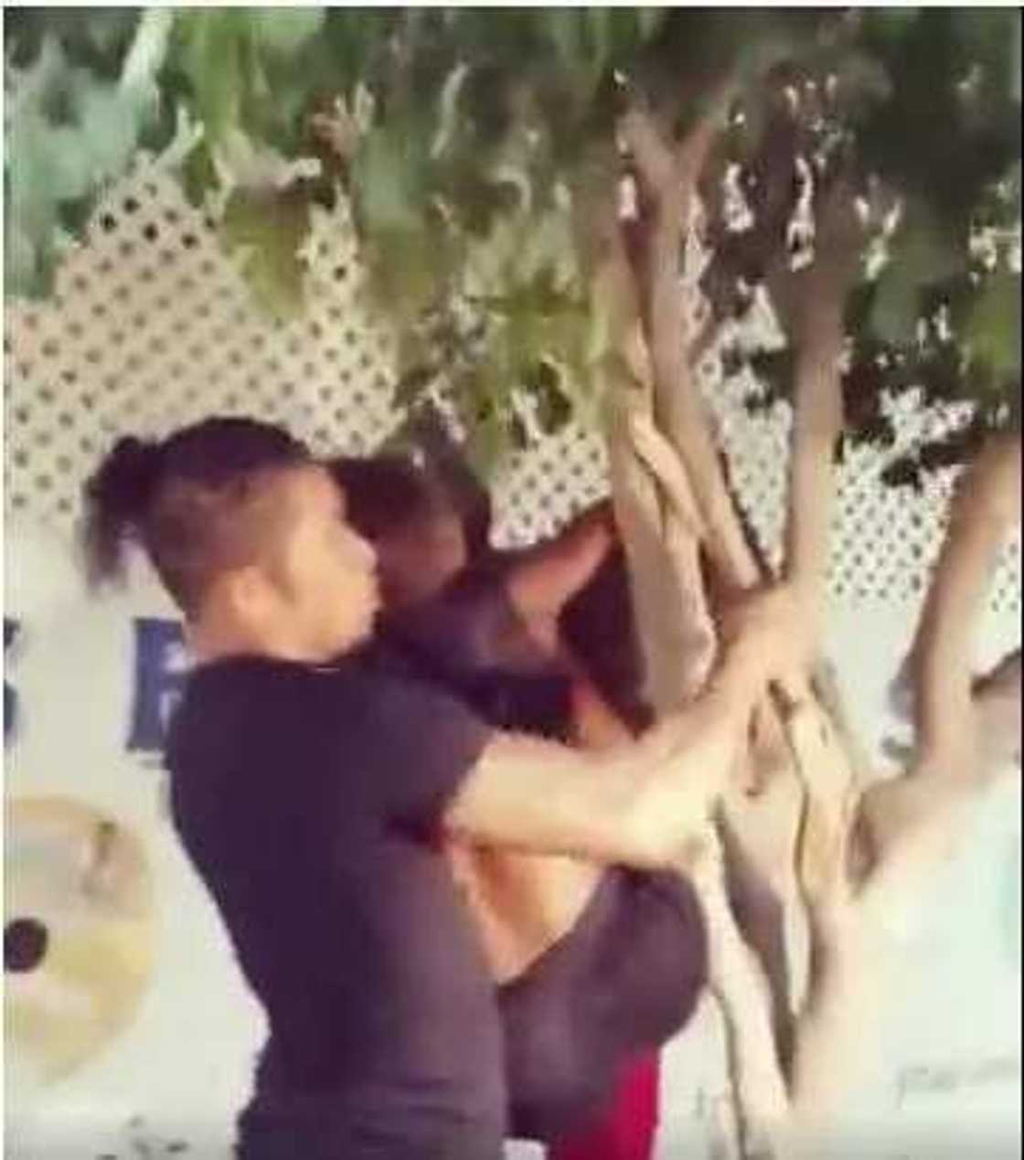 See what two men did to a lady in public (photos, video) See what two men did to a lady in public (photos, video)