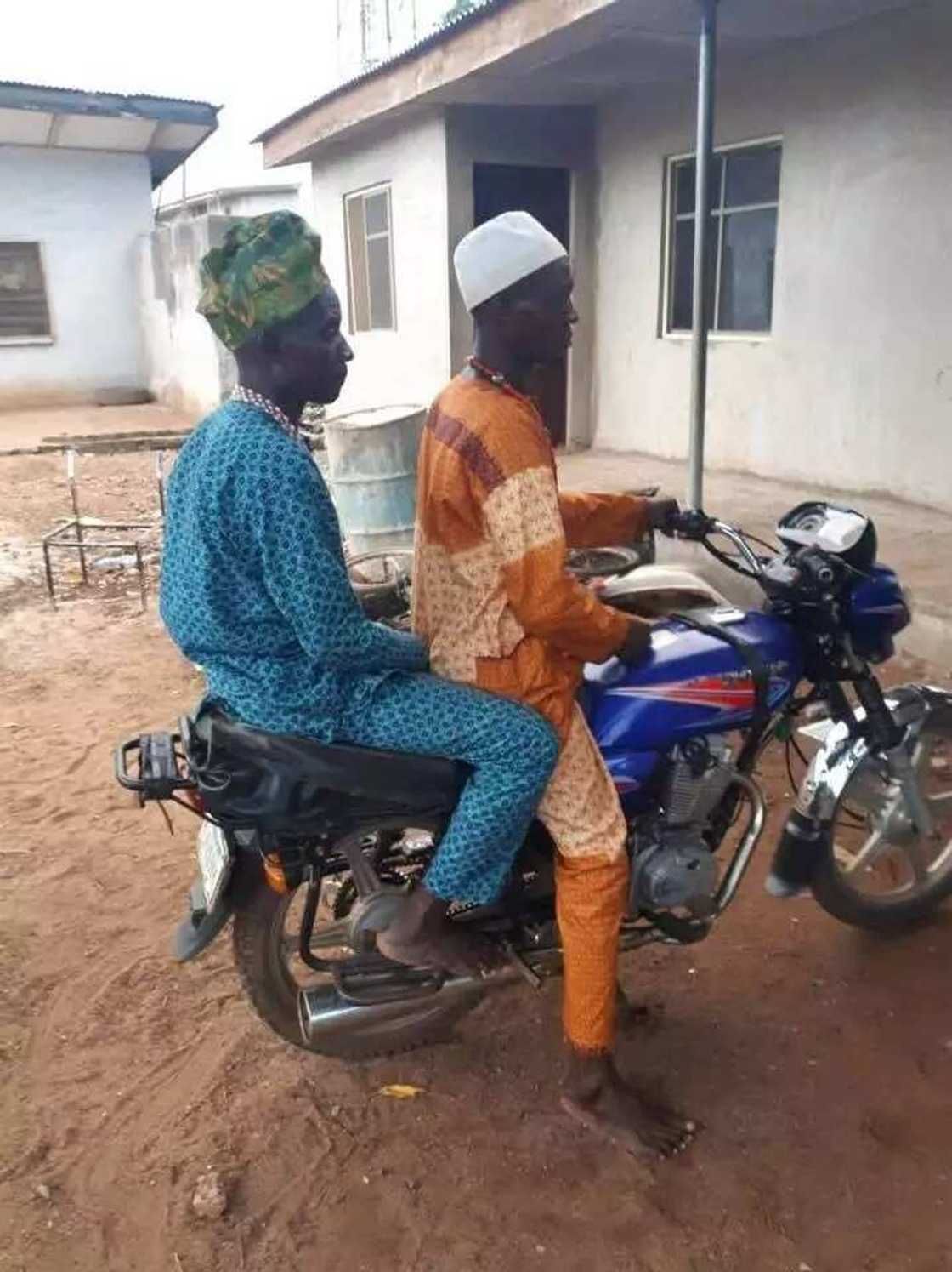 Some of the suspects showing the police how they ride with the rifle under the seat. Photo source: Abba Kyari Some of the suspects showing the police how they ride with the rifle under the seat. Photo source: Abba Kyari
