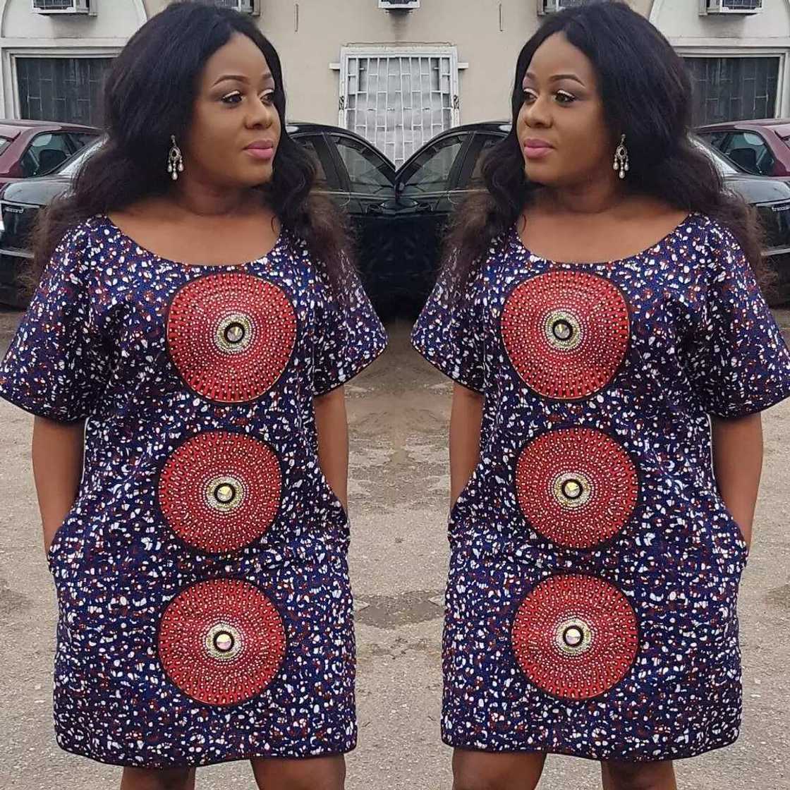 Ankara short gown style with spacious cut Ankara short gown style with spacious cut