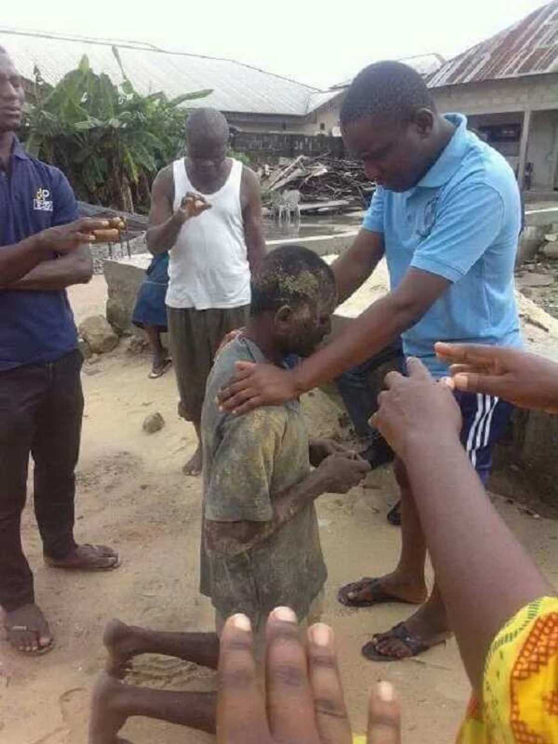 Man caught stealing at church in Warri, Delta state, receives prayers from members (Photos) Man caught stealing at church in Warri, Delta state, receives prayers from members (Photos)