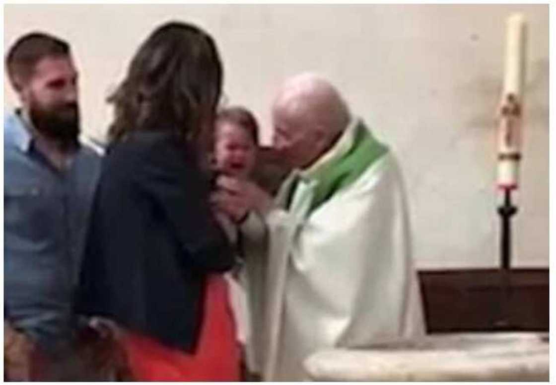 Angry priest slaps baby who wouldn’t stop crying during baptism Angry priest slaps baby who wouldn’t stop crying during baptism