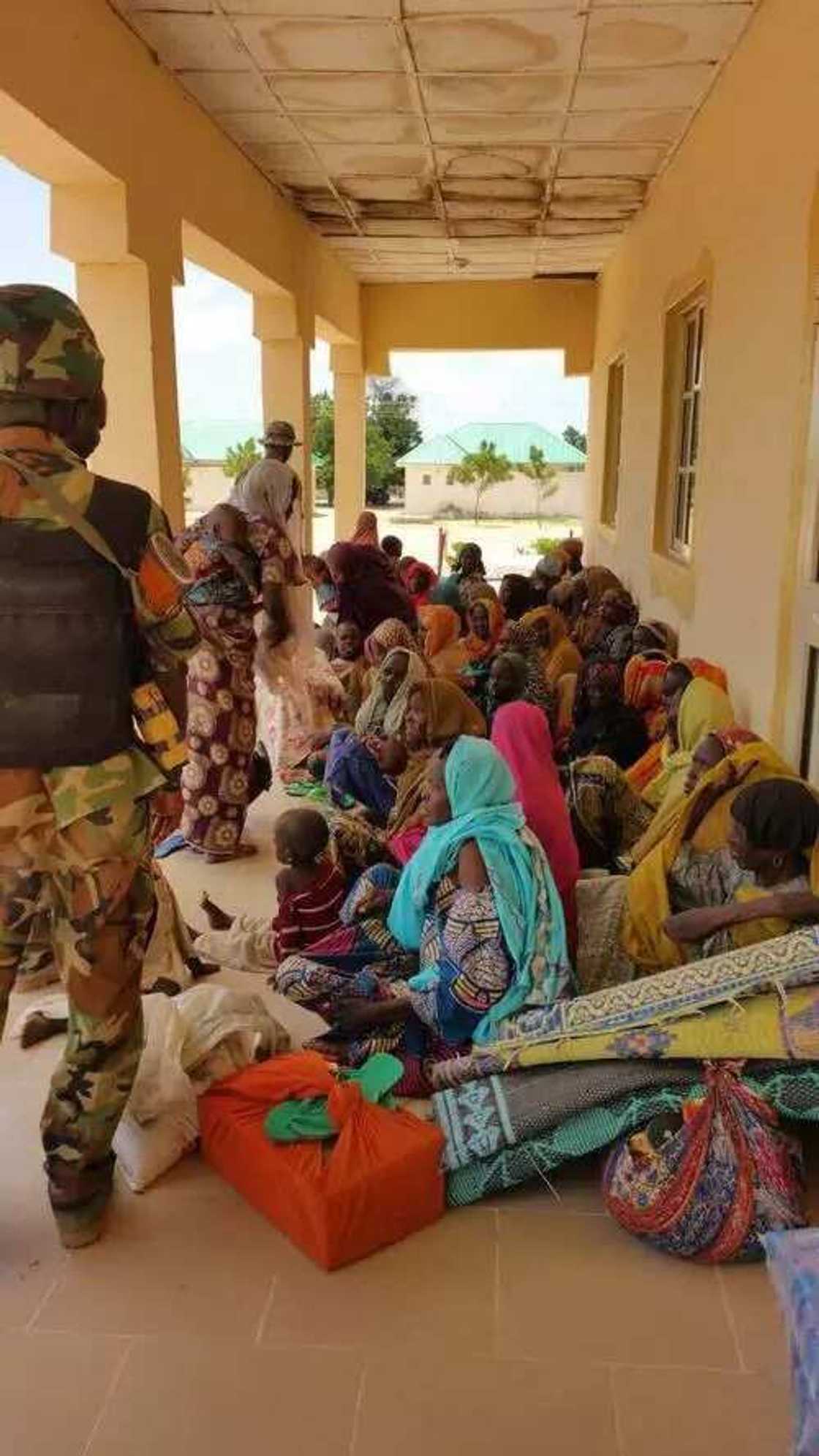 12 Boko Haram Wives Surrender To Civilian JTF 12 Boko Haram Wives Surrender To Civilian JTF