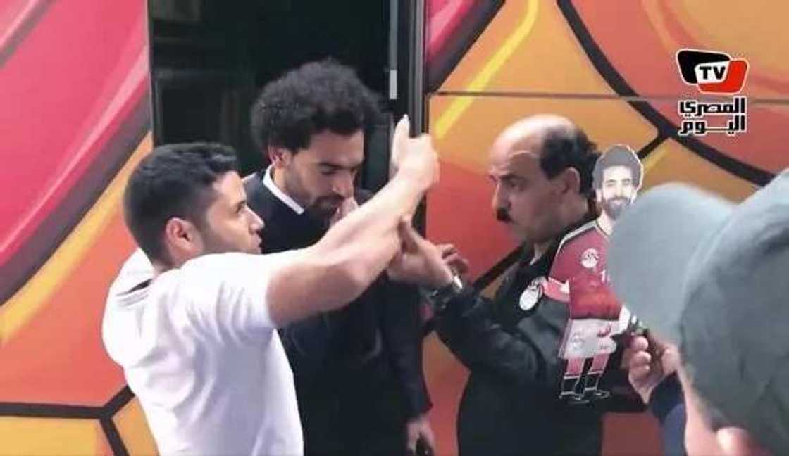 Egypt fan grabs Mohamed Salah's shoulder for selfie in Russia Egypt fan grabs Mohamed Salah's shoulder for selfie in Russia