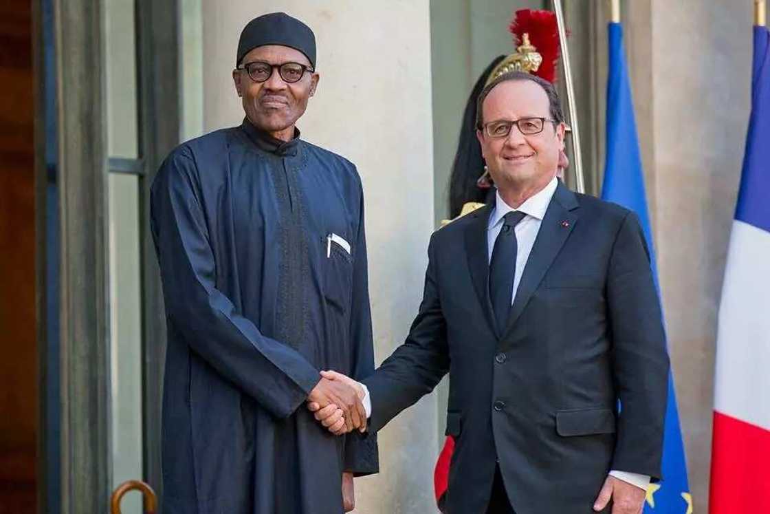 Buhari Meets With Hollande In Paris Buhari Meets With Hollande In Paris
