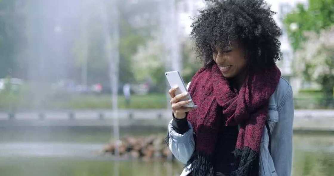 A girl at a fountain