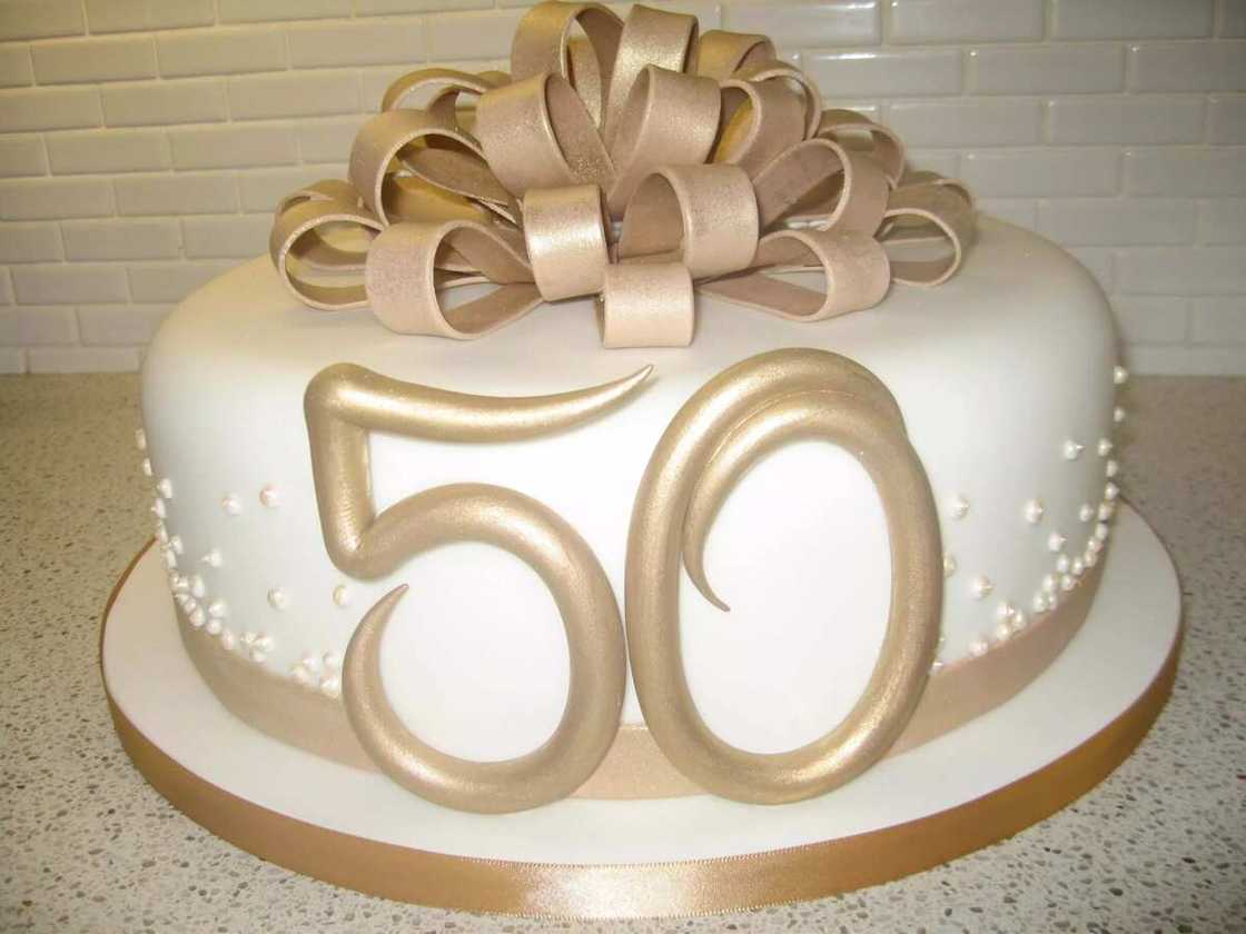 Golden wedding anniversary decorated cake Golden wedding anniversary decorated cake