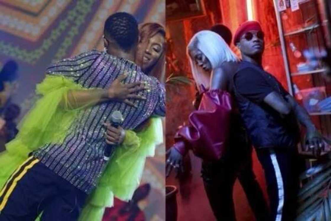 Wizkid and Tiwa embrace Wizkid and Tiwa embrace