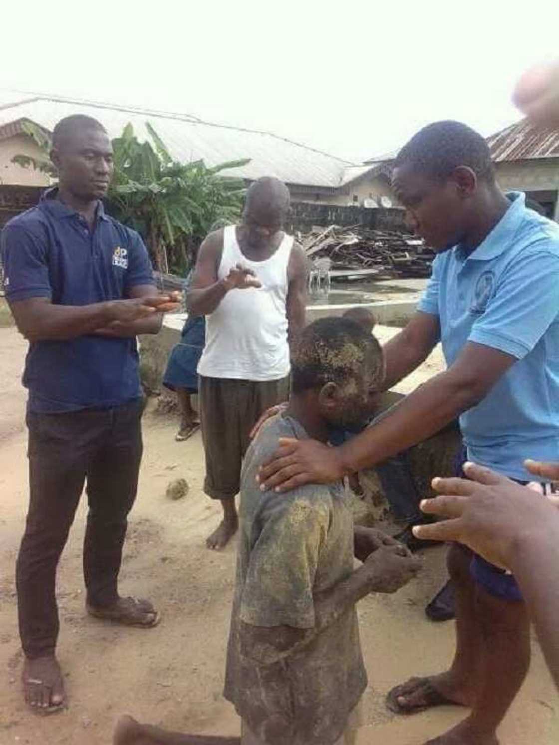 Man caught stealing at church in Warri, Delta state, receives prayers from members (Photos) Man caught stealing at church in Warri, Delta state, receives prayers from members (Photos)