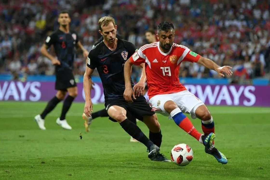 Russia's Ignashevich and teammate retire after quarterfinal exit at the World Cup Russia's Ignashevich and teammate retire after quarterfinal exit at the World Cup