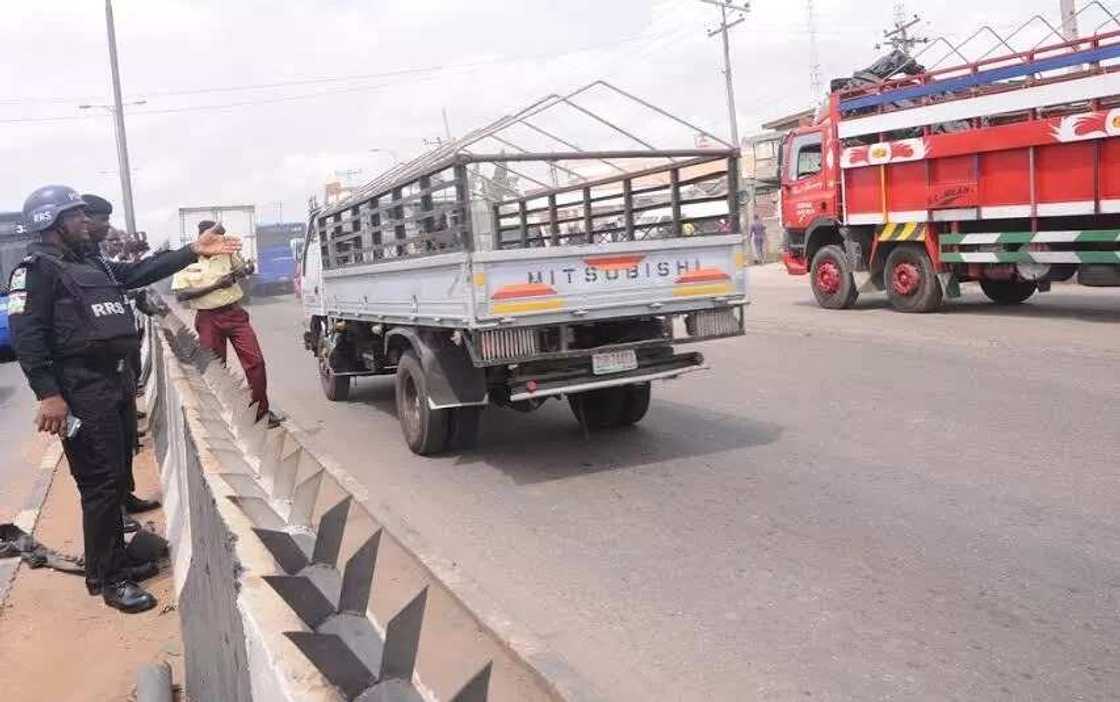 Police maintains law and order at Ojota pedestrian bridge