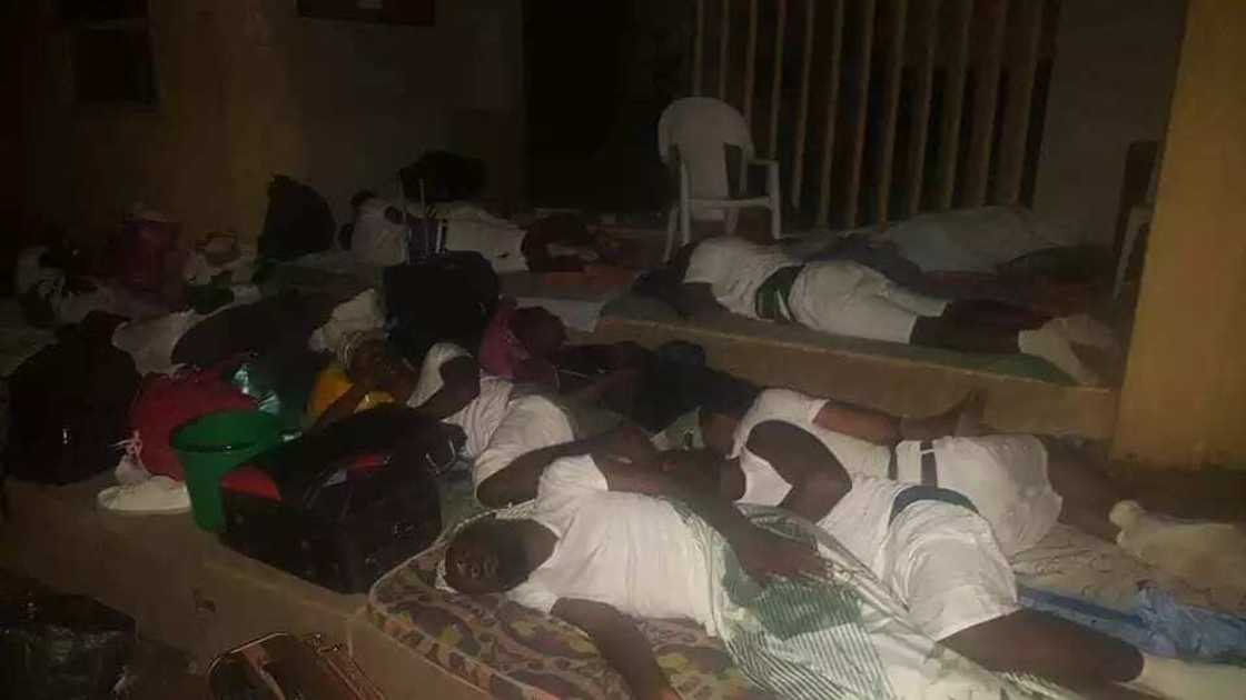 Corp members sleeping outside.