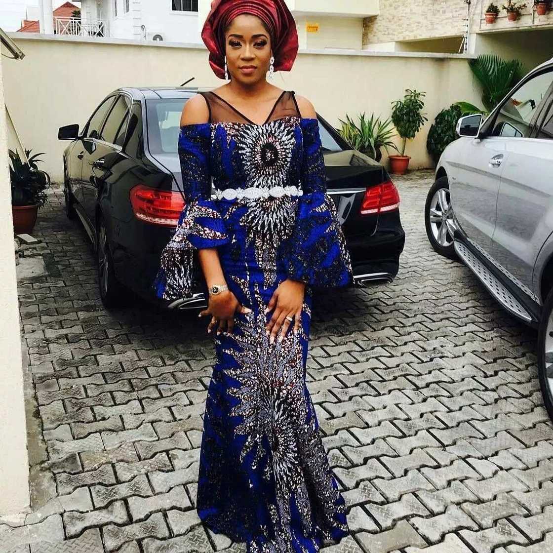 Ankara style for Aso Ebi with flared sleeves Ankara style for Aso Ebi with flared sleeves