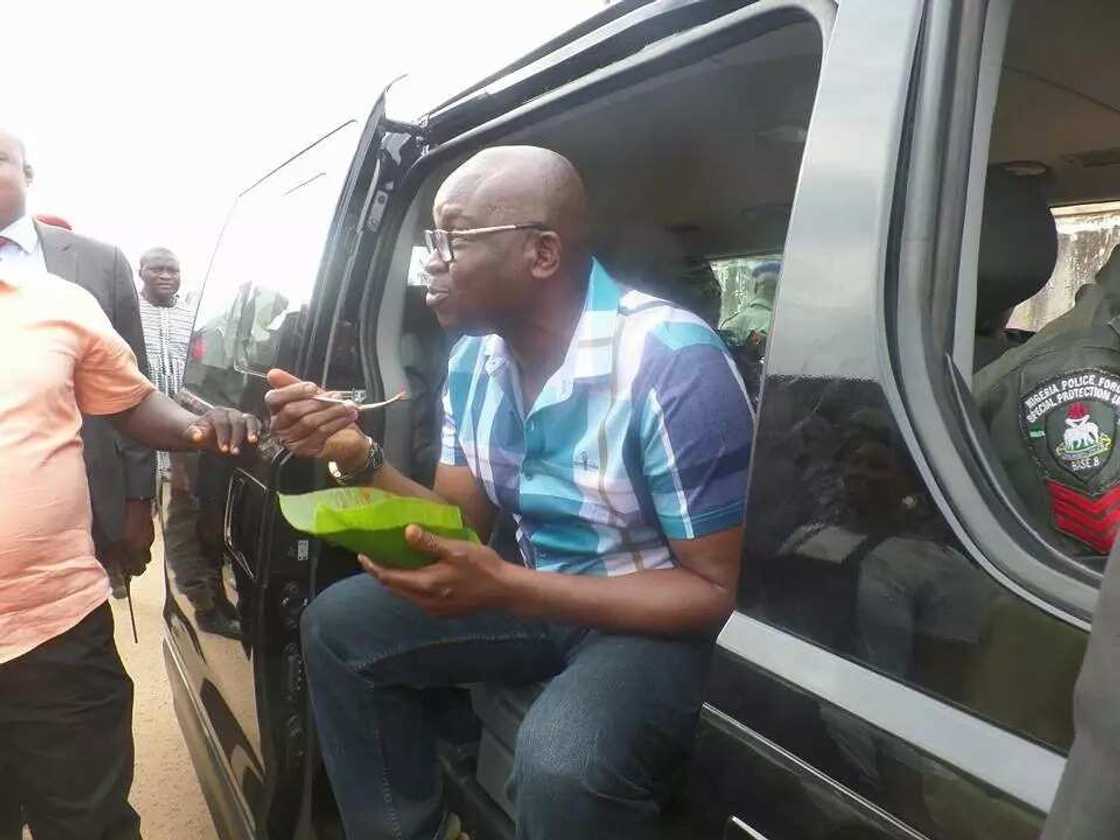 Fayose seen eating rice at road-side canteen Fayose seen eating rice at road-side canteen