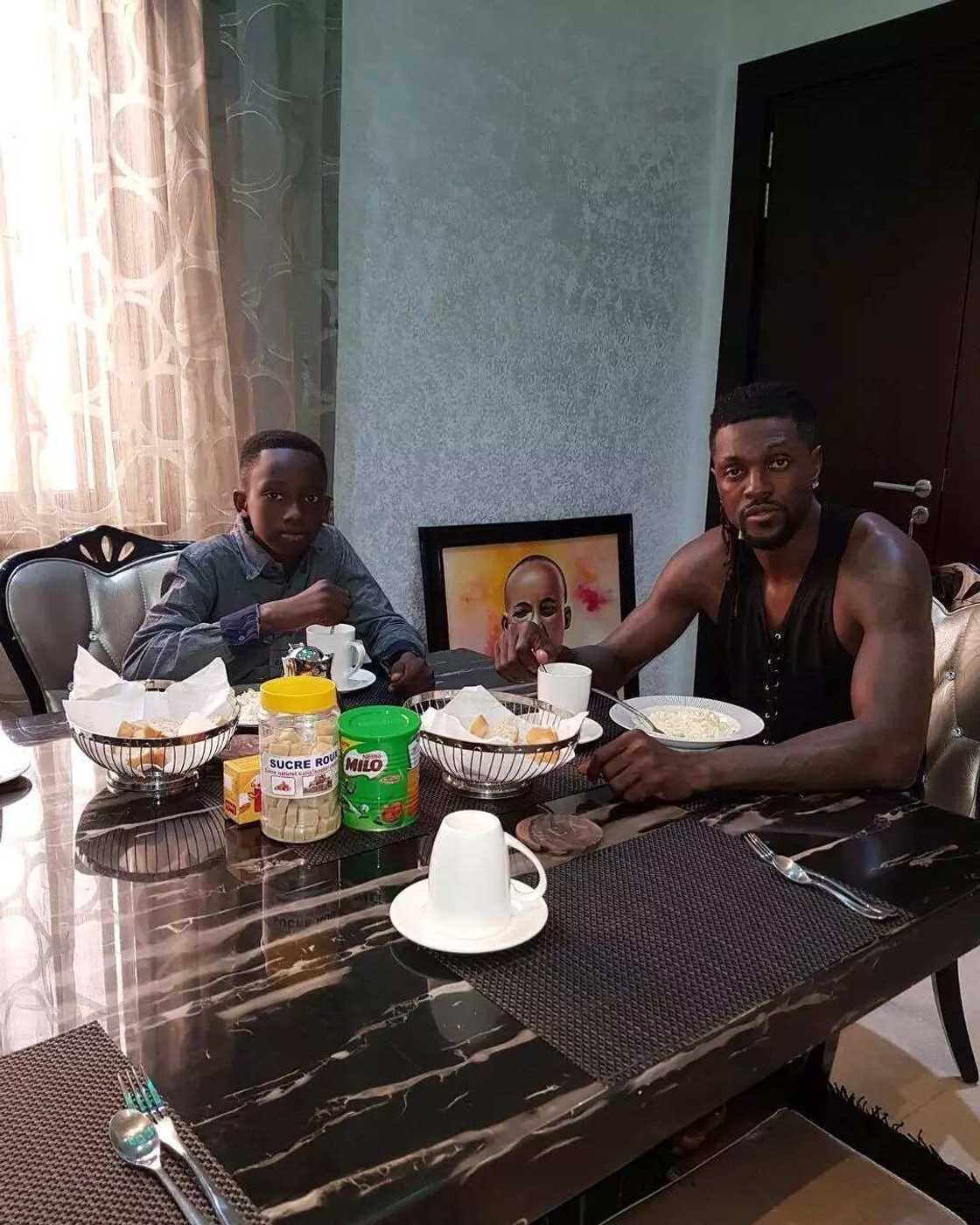 Emmanuel Adebayor adopts late brother's son (photo) Emmanuel Adebayor adopts late brother's son (photo)