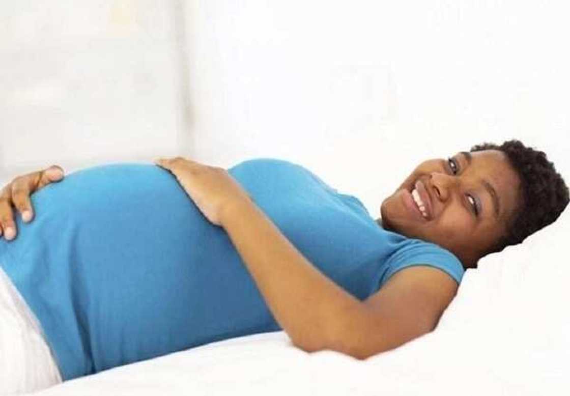 pregnant woman in bed