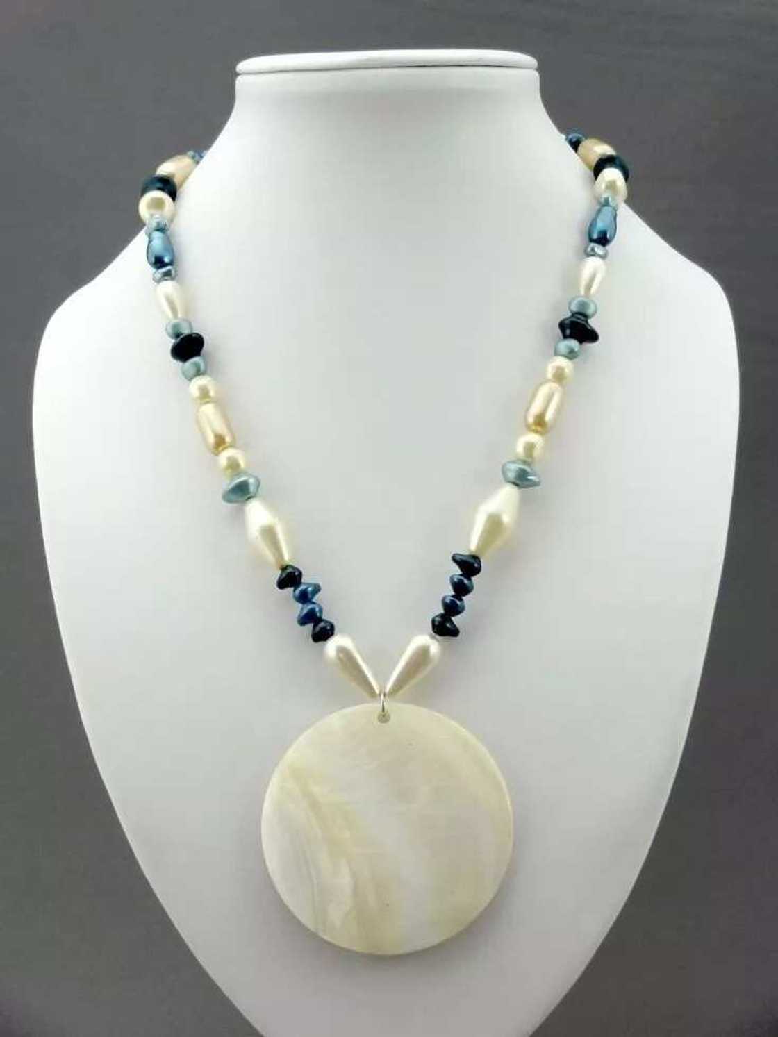 Necklace with beads and large pendant Necklace with beads and large pendant