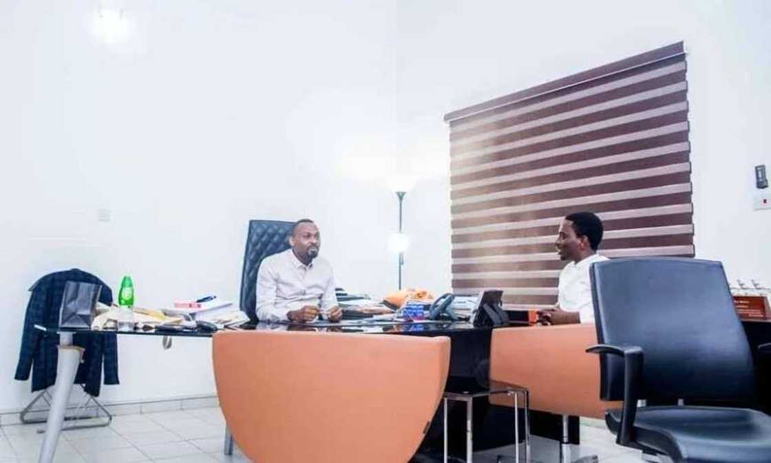 Who is PayPorte owner at his office Who is PayPorte owner at his office