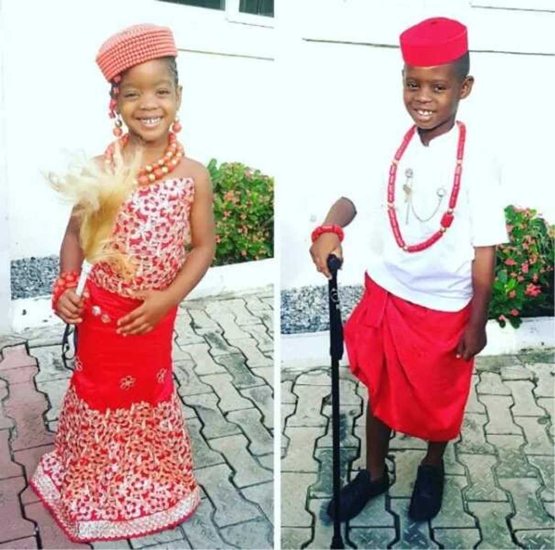 Igbo traditional attire for boy with a red wrapper and white tunic (Jason and Ada Okpocha, www.bellanaija.com) Igbo traditional attire for boy with a red wrapper and white tunic (Jason and Ada Okpocha, www.bellanaija.com)