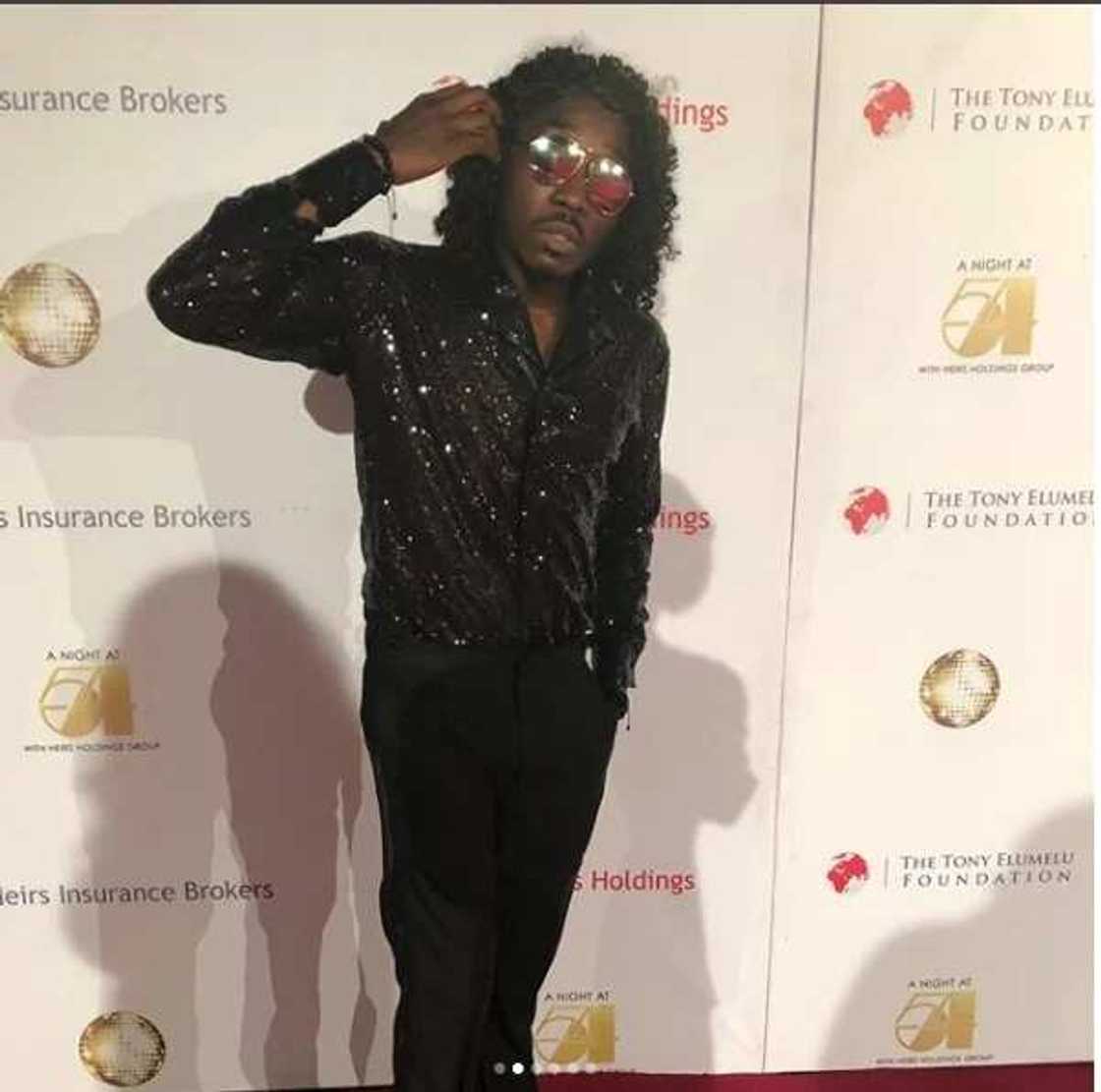 Comedian Bovi steps out to an event in long weave-on like old school stars (photos) Comedian Bovi steps out to an event in long weave-on like old school stars (photos)