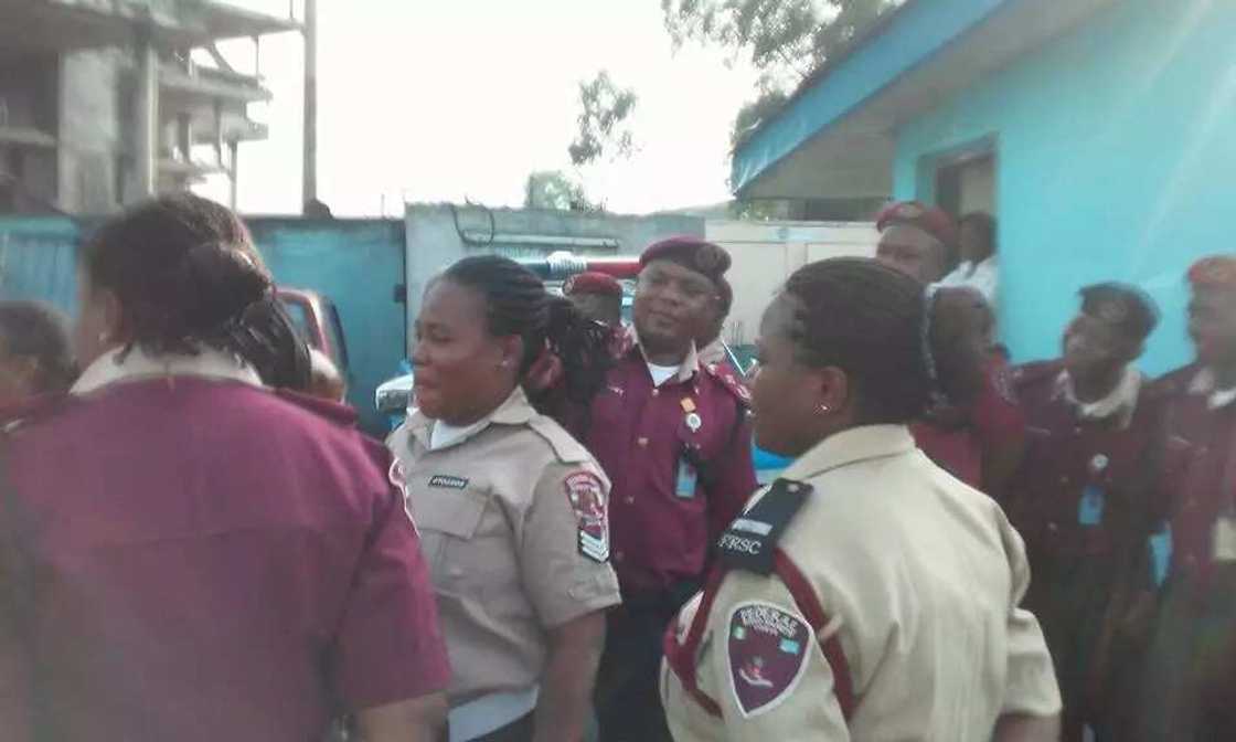 FRSC Sector Commander cutting off female officers' hairs FRSC Sector Commander cutting off female officers' hairs