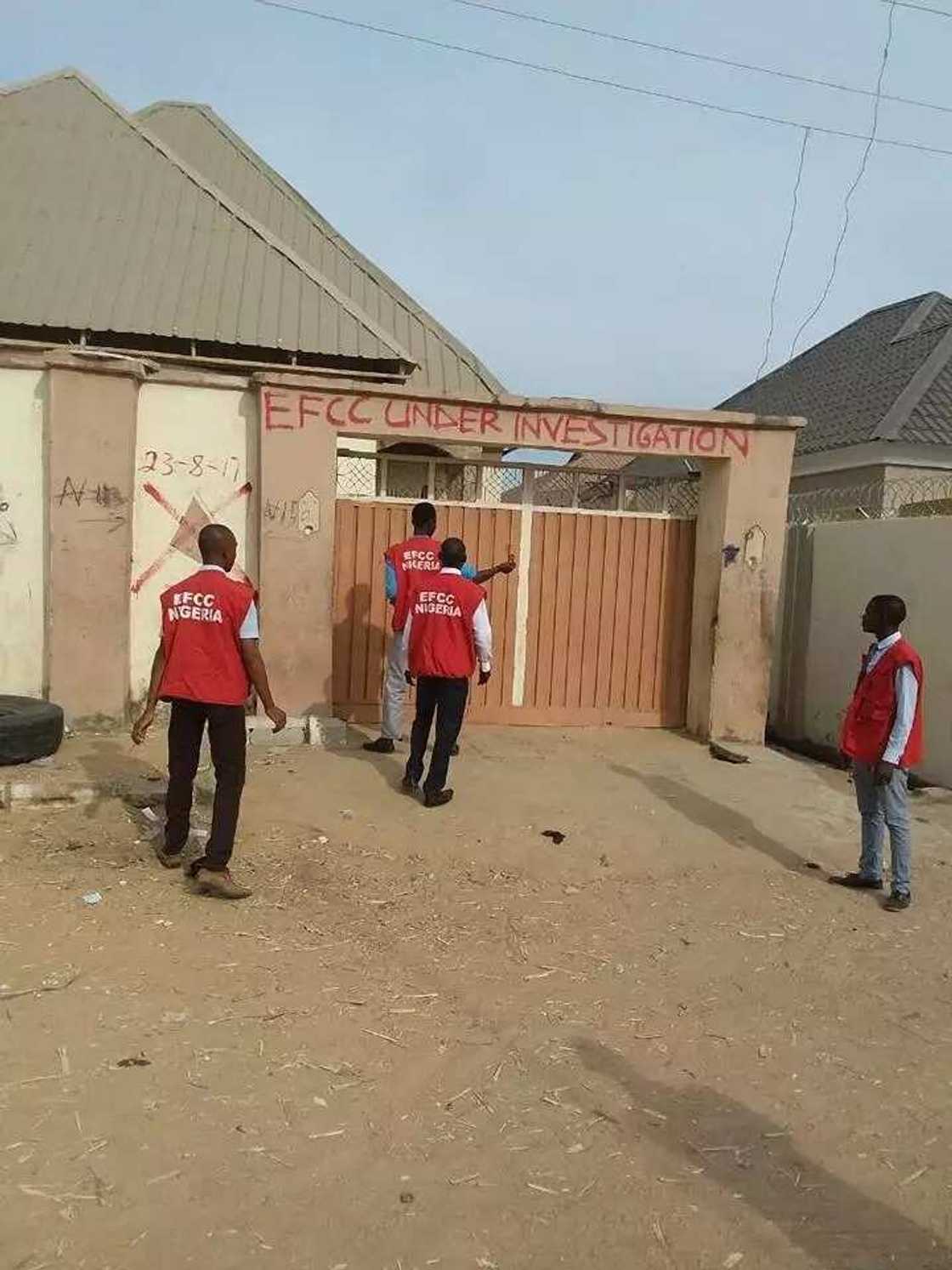 EFCC officials in front of one of the properties
Source: Facebook, EFCC