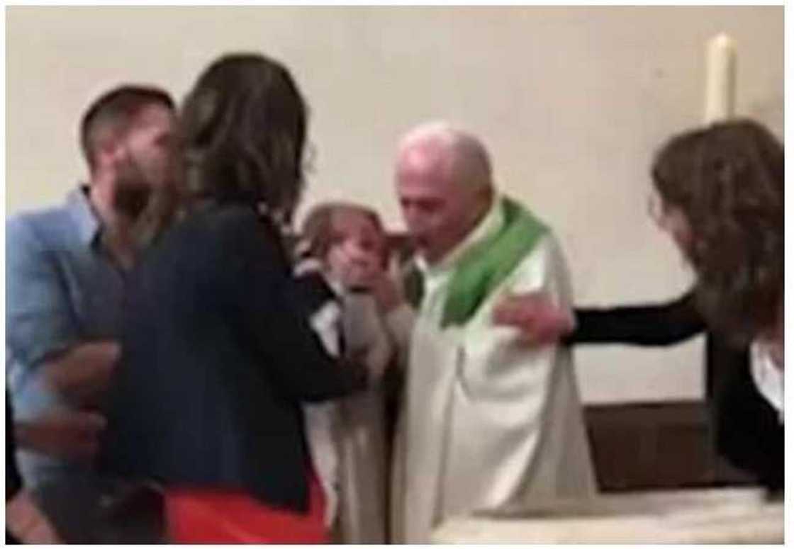 Angry priest slaps baby who wouldn’t stop crying during baptism Angry priest slaps baby who wouldn’t stop crying during baptism