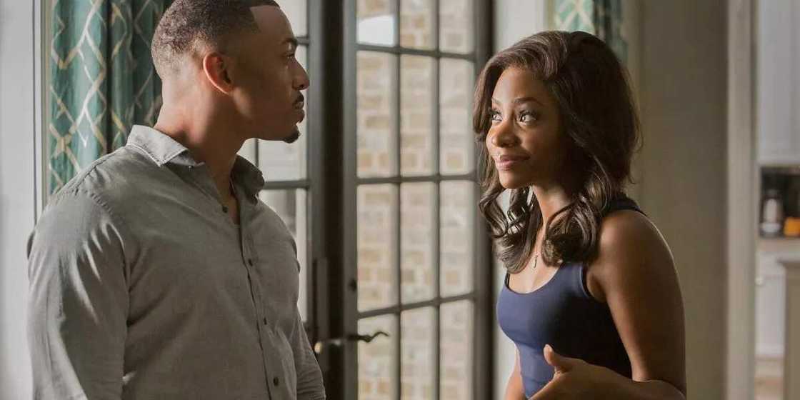 A man and a girl try to communicate A man and a girl try to communicate