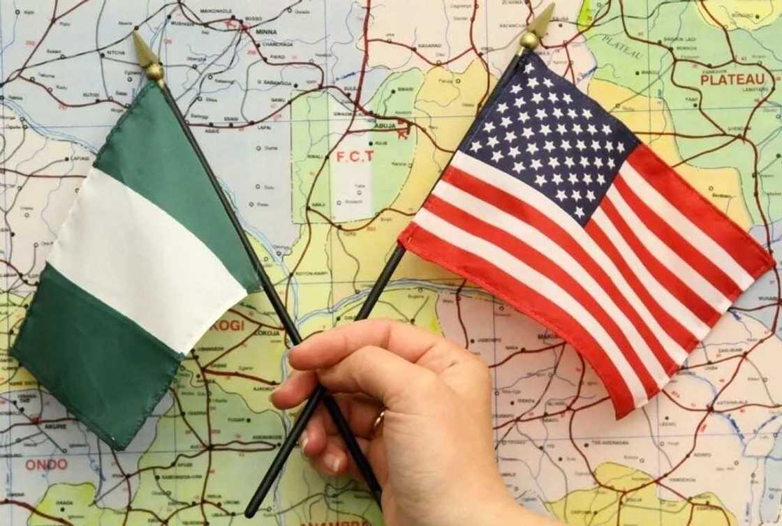 Nigerian and United States flags Nigerian and United States flags