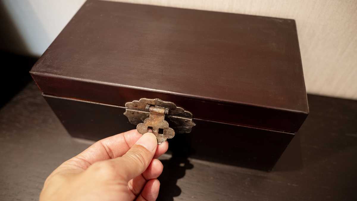 My husband made me promise never to open his locked box — Then it fell